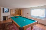 The game room includes a pool table, ping pong, and flat screen tv